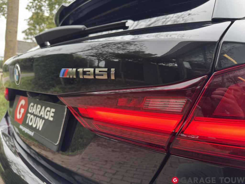 BMW 1 Serie m135i xdrive high executive edition pano orig.nl