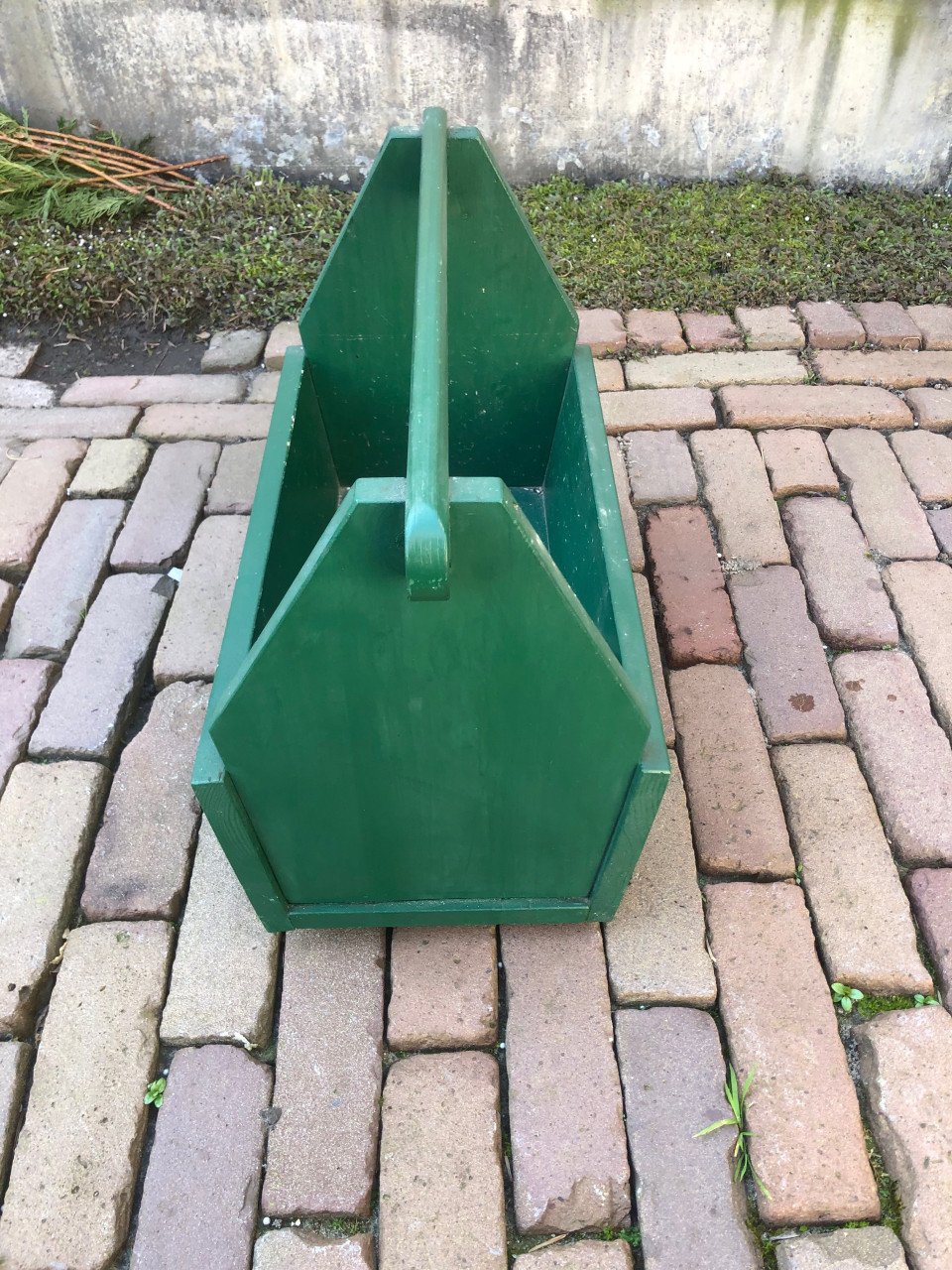 Groene houten bak.