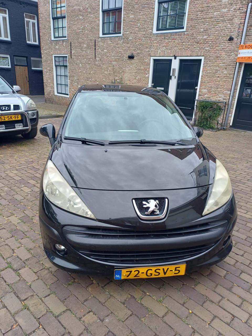 Te koop zwarte peugeot 207