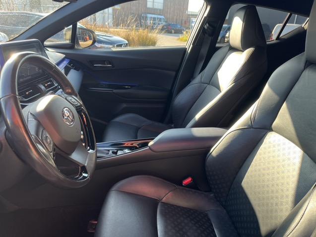 Toyota C-hr 1.8 hybrid bi-tone | leer | 18'' | camera | nav | 73.000km!