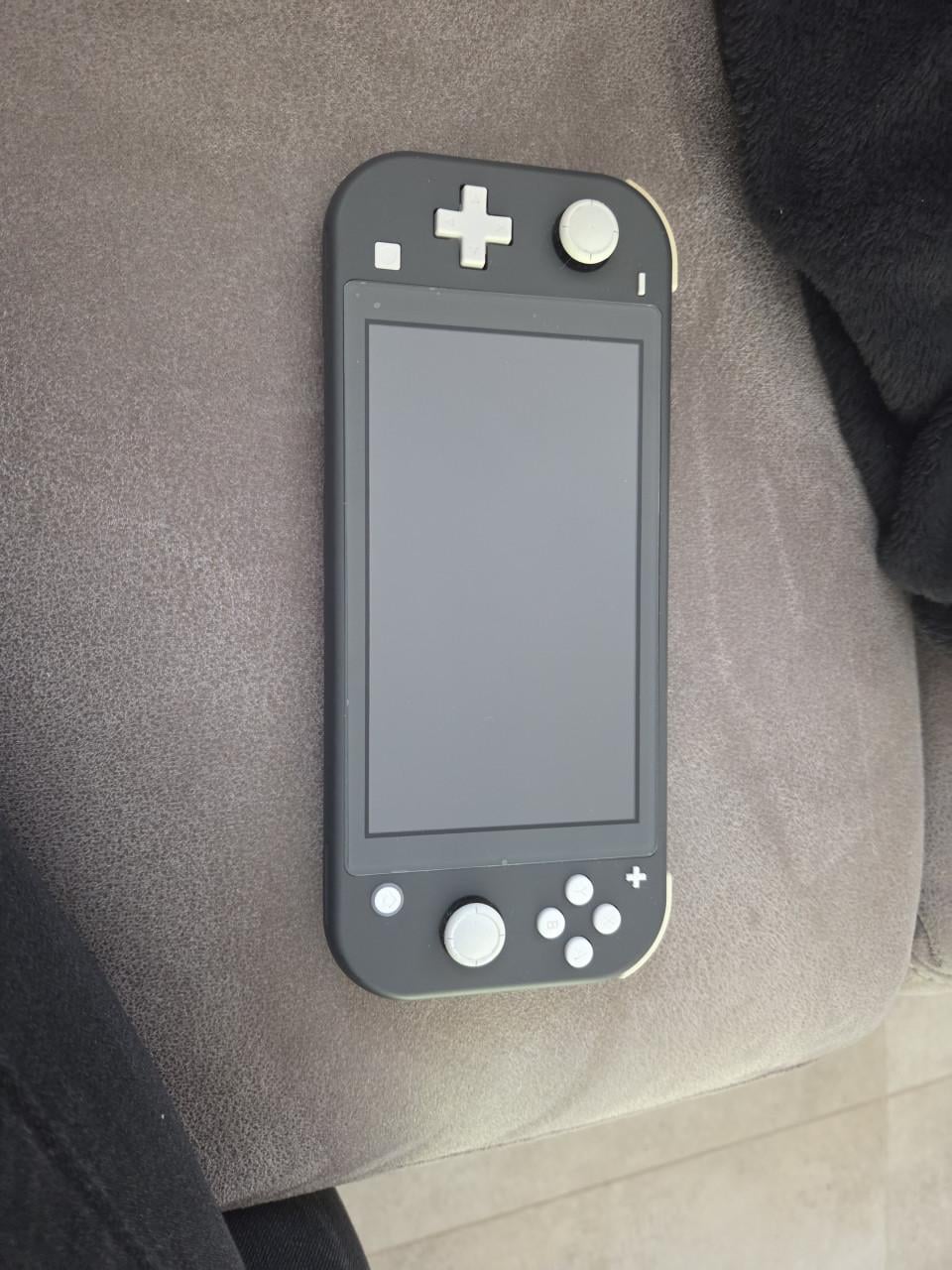 Nintendo Switch Lite grijs en geel evt. incl. spellen