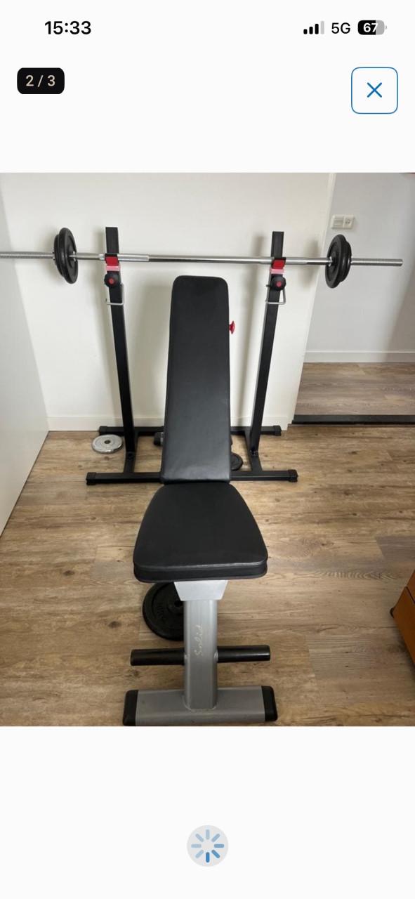 Halterbanl met stang en gewichten