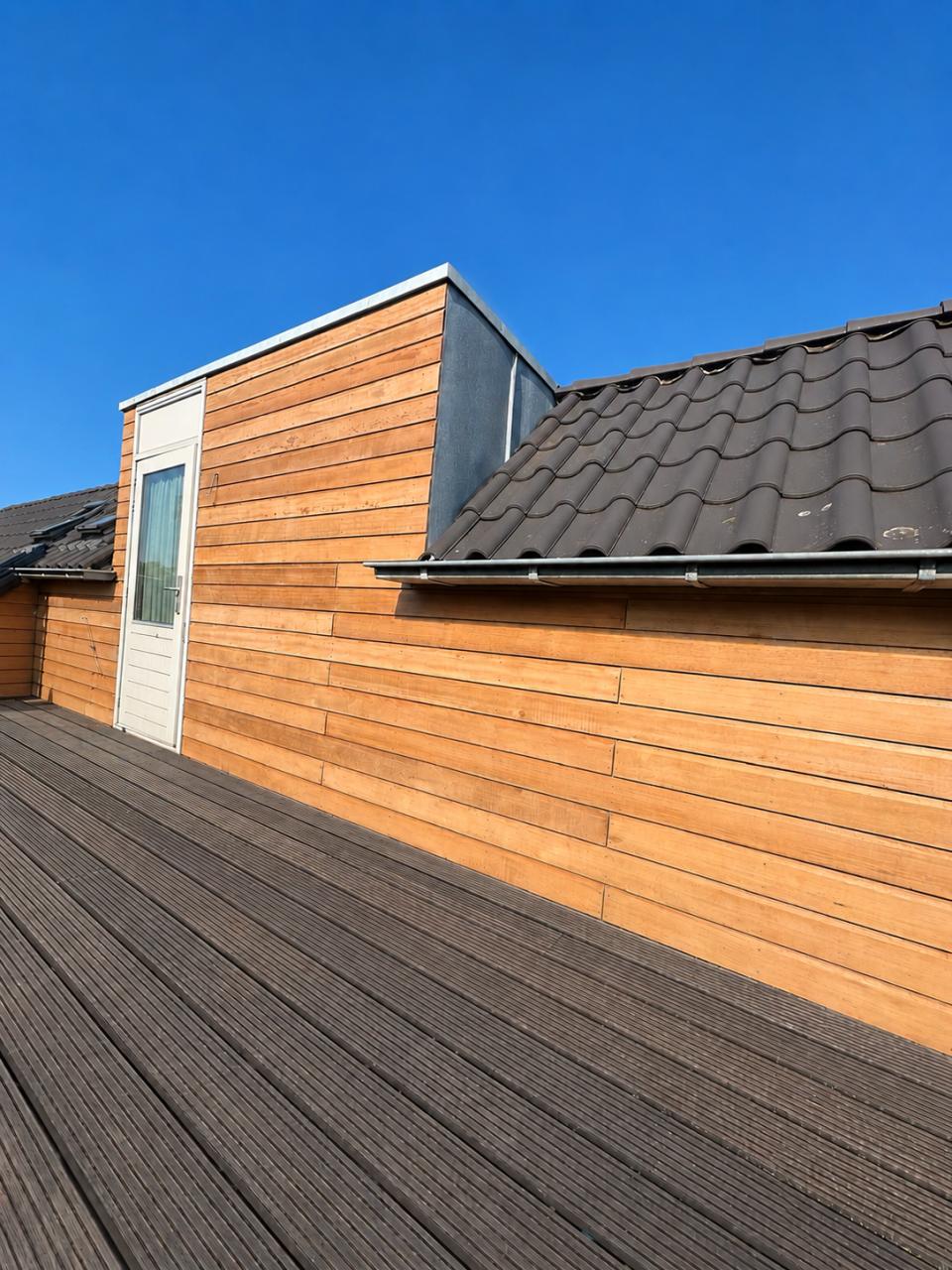 Houten overkappingen, tuinkamers en schuren op maat.