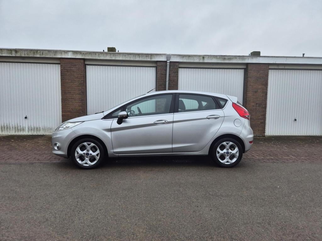 Ford Fiesta 1.25 titanium / origineel nl / airco / verwarmde voorruit