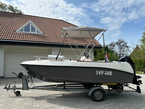 Mooie Elan 15SC met vrijwel nieuwe Mercury 60 pk en Pega trailer