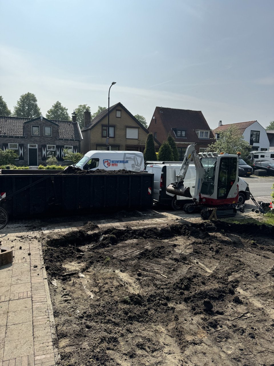 Graafwerk | Tuin afgraven | minigraver met machinist