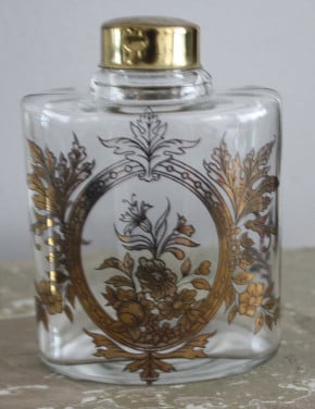 Flesje transparant met transparant goudkleurige  bloemen print