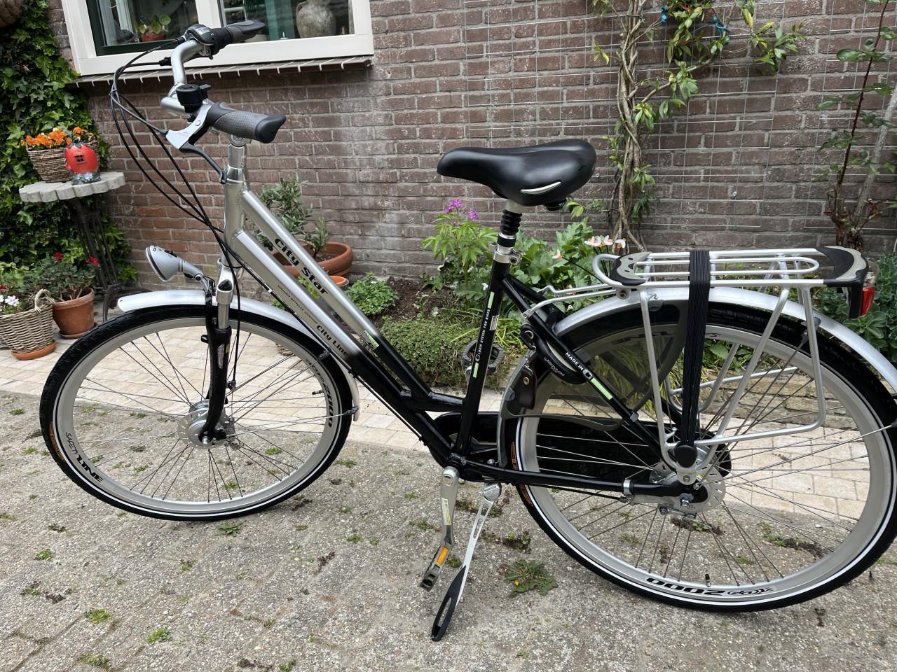 Dames fiets City Star 8 versn trom-rem verlichting Uit de Gazelle familie..
