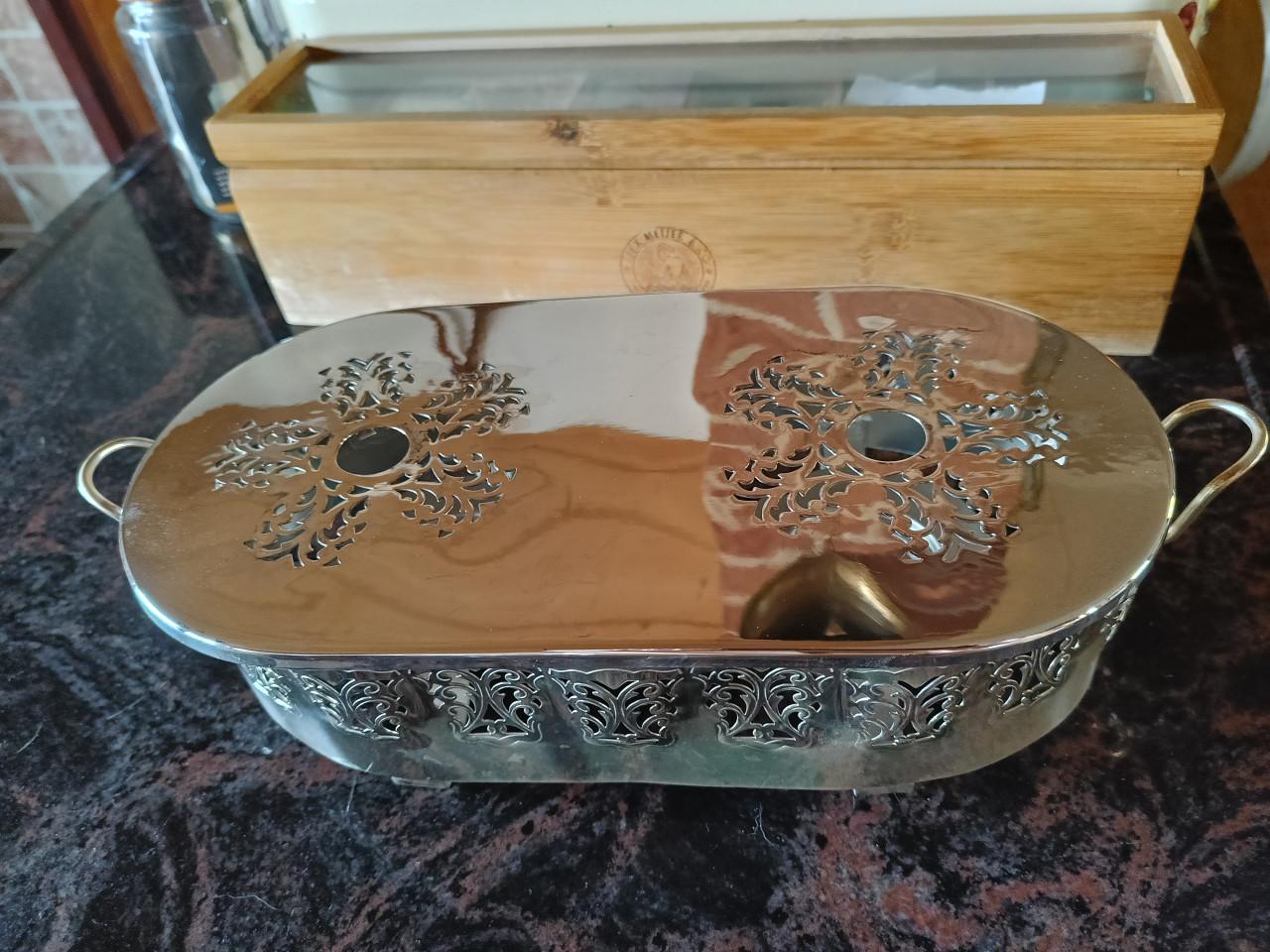 Vintage verzilverde warm houd plaat