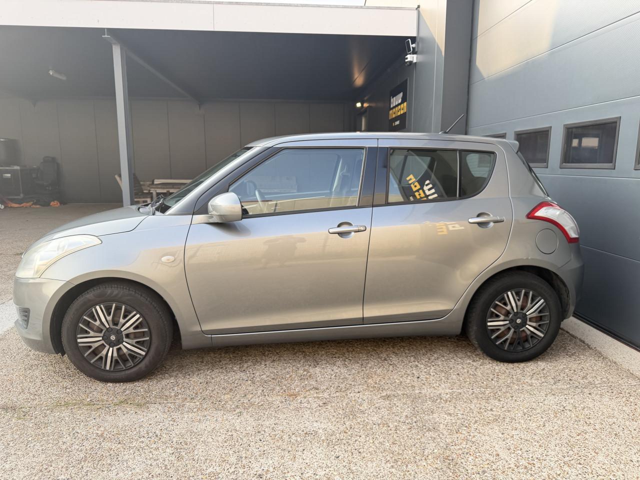 Suzuki Swift 1.2 Comfort EASSS 2011 5Drs Grijs Airco Apk Nap Navi