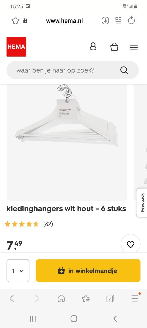 Witte houten kledinghaakjes