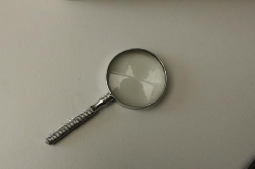 Kleine metalen loupe