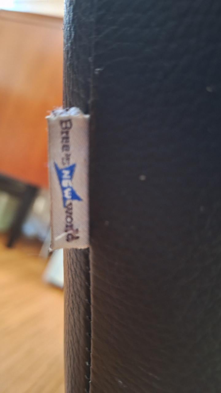 Zwart lederen relaxfauteuil met draaipoot