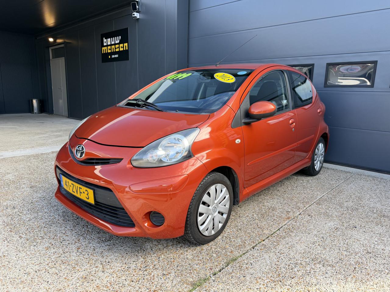 Toyota Aygo 1.0 12V Vvt-i 5DRS 2013 Dynamic Orange Airco Apk
