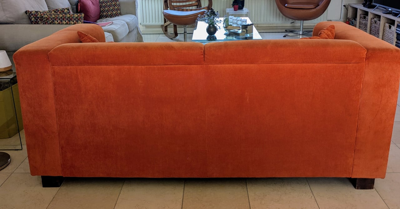 Vintage 2-zitsbank oranje ribcord. Gratis op te halen.