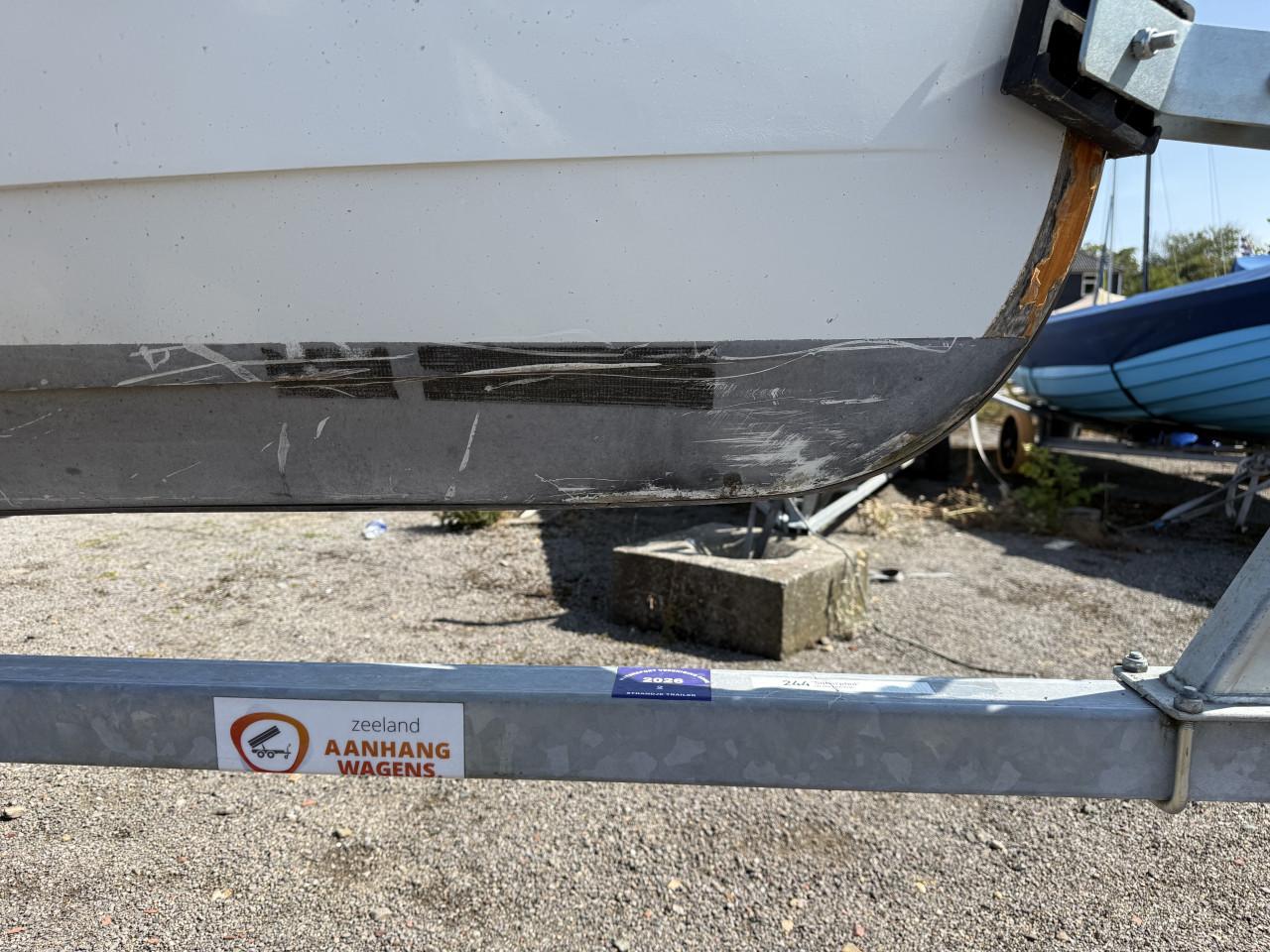 Tweepersoons houten roeiboot