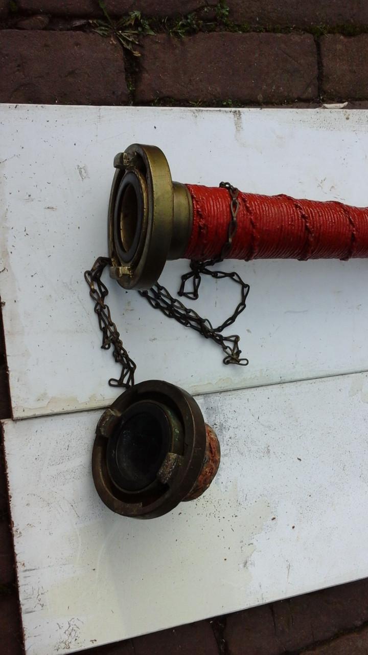 Koperen brandweerspuit