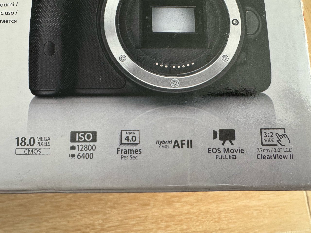 Compacte Canon EOS 100D camerabody + diverse accessoires