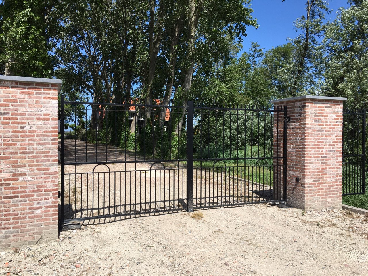 Stijlvolle Inrijpoorten / Automatische Inrijpoorten.