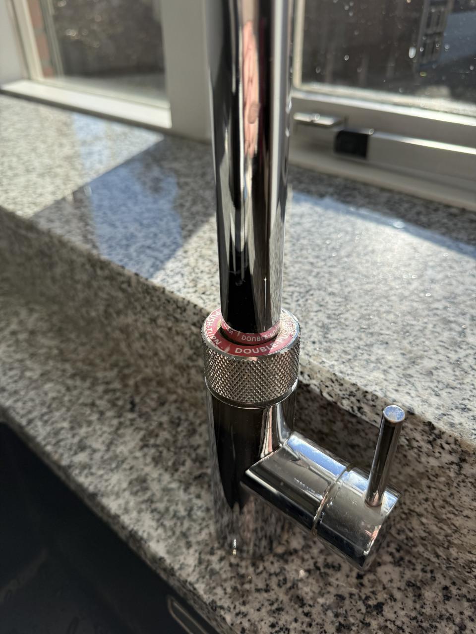 Complete hoekkeuken met Quooker, Siemens en Atag apparatuur