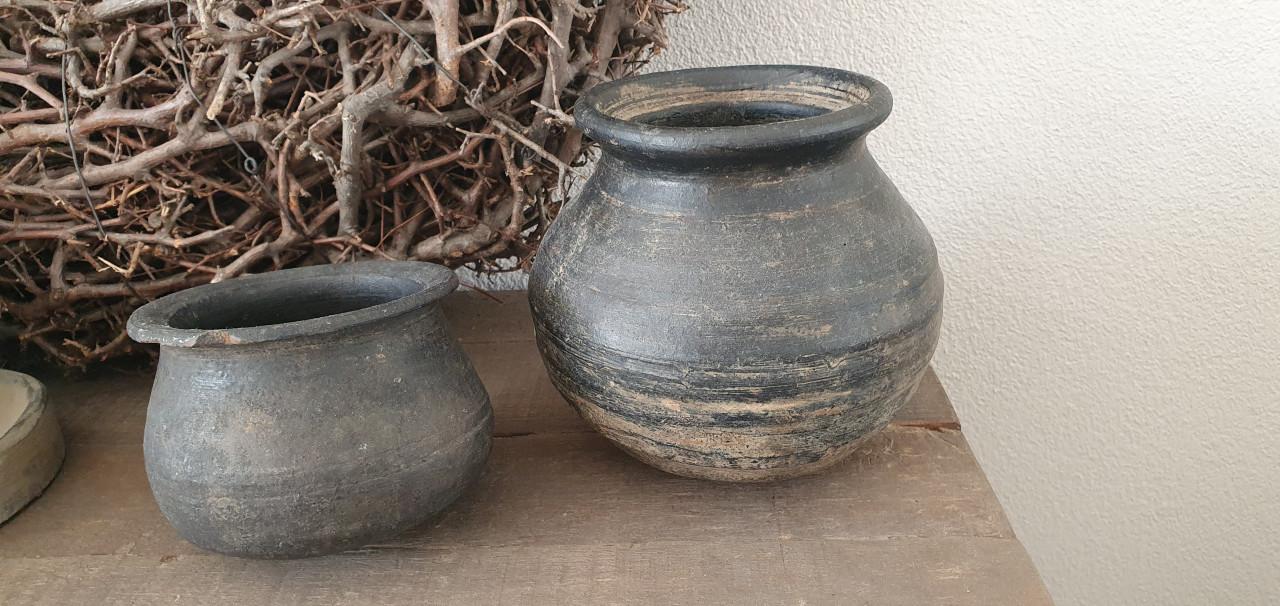 Oude tuimelpotjes prachtig doorleefd