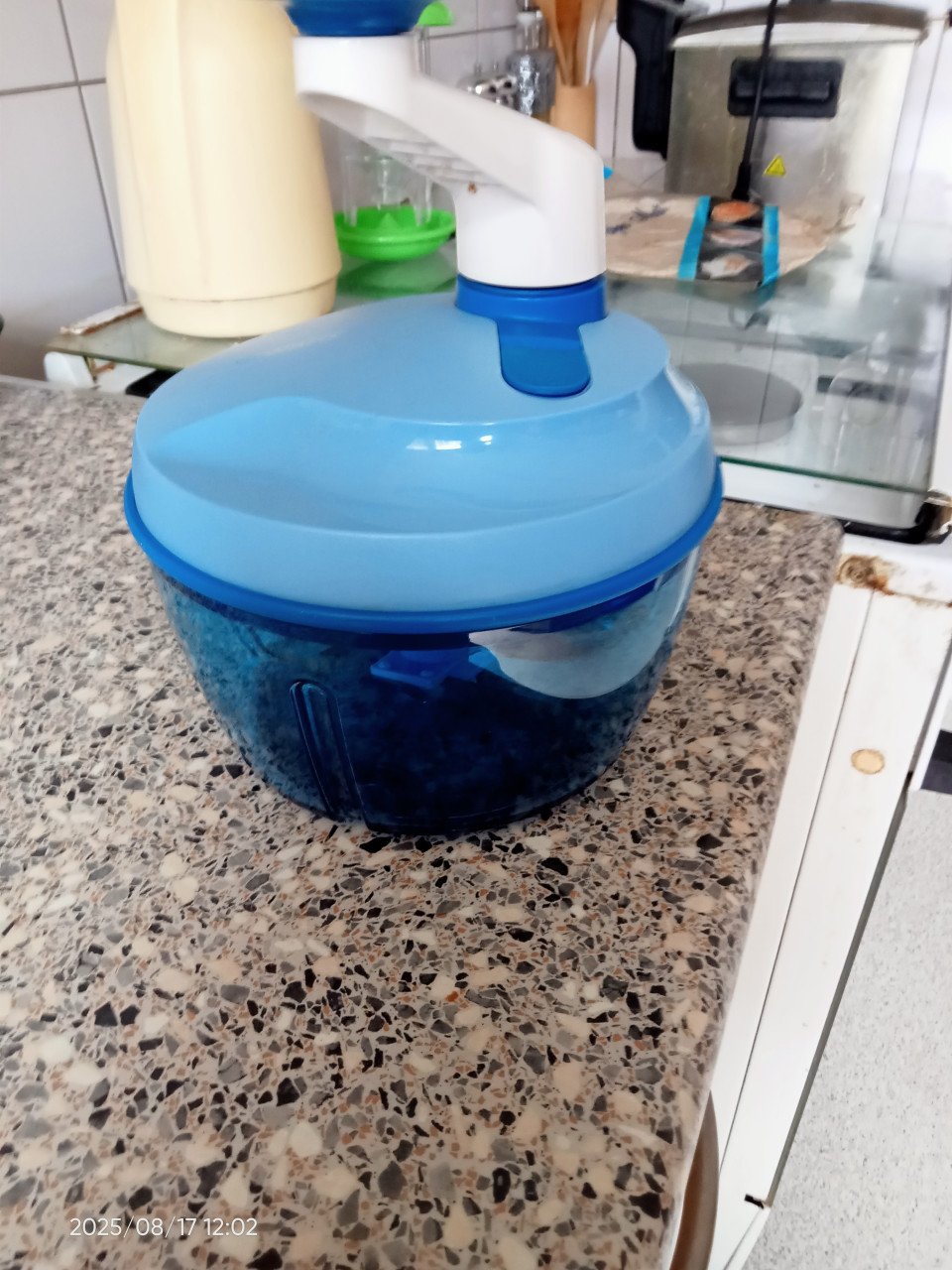 Tupperware apparaat om iets fijn te hakken