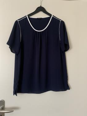 Dames shirt.     Question. Marineblauw met Wit.