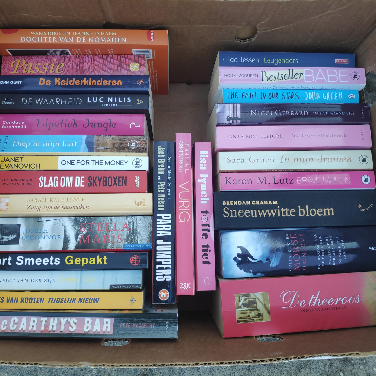 Vrijwillige bijdrage aan De Boekenwurm in ruil voor doos BOEKEN