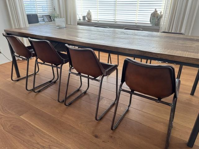 8 stuks lederen eetkamerstoelen