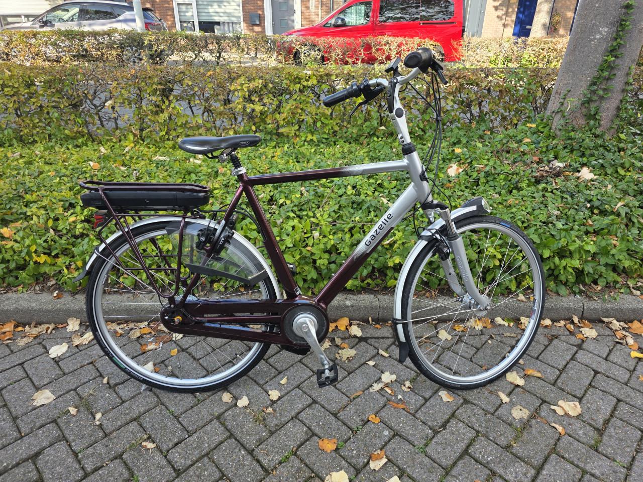 Schitterende Gazelle Orange elektrische heren fiets met middenmotor