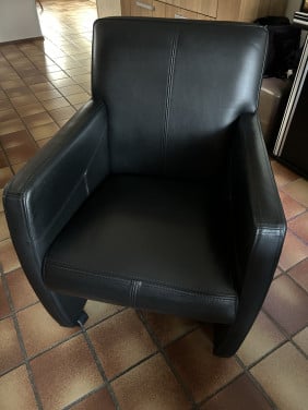 Zwart leren tafel stoelen