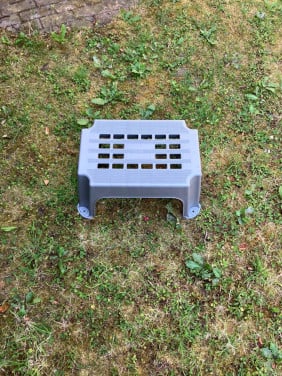 Caravan opstapje en benzine jerrycan