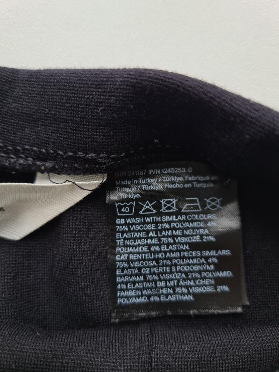 Zwarte flared broek van H&M  Maat 128