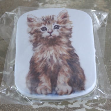 Nieuw in verpakking klein b;ikje pillen doosje met kat