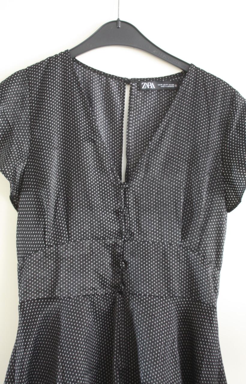 Zwarte jurk met witte stippen maat m