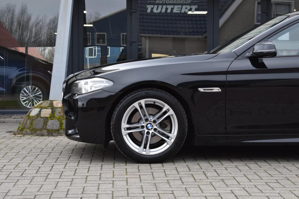 BMW 5 Serie 520i m sport | schuifdak | camera | leder | nap | adapt. cruise