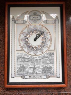Wandklok met dorpsgezichten Hoedekenskerke