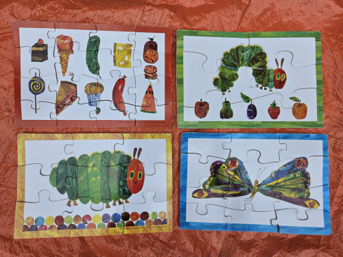Rupsje Nooit Genoeg - vier houten puzzeltjes