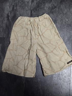 Wijde, beige corduroy broek met een abstract patroon van "Rag Girl" Maat 98