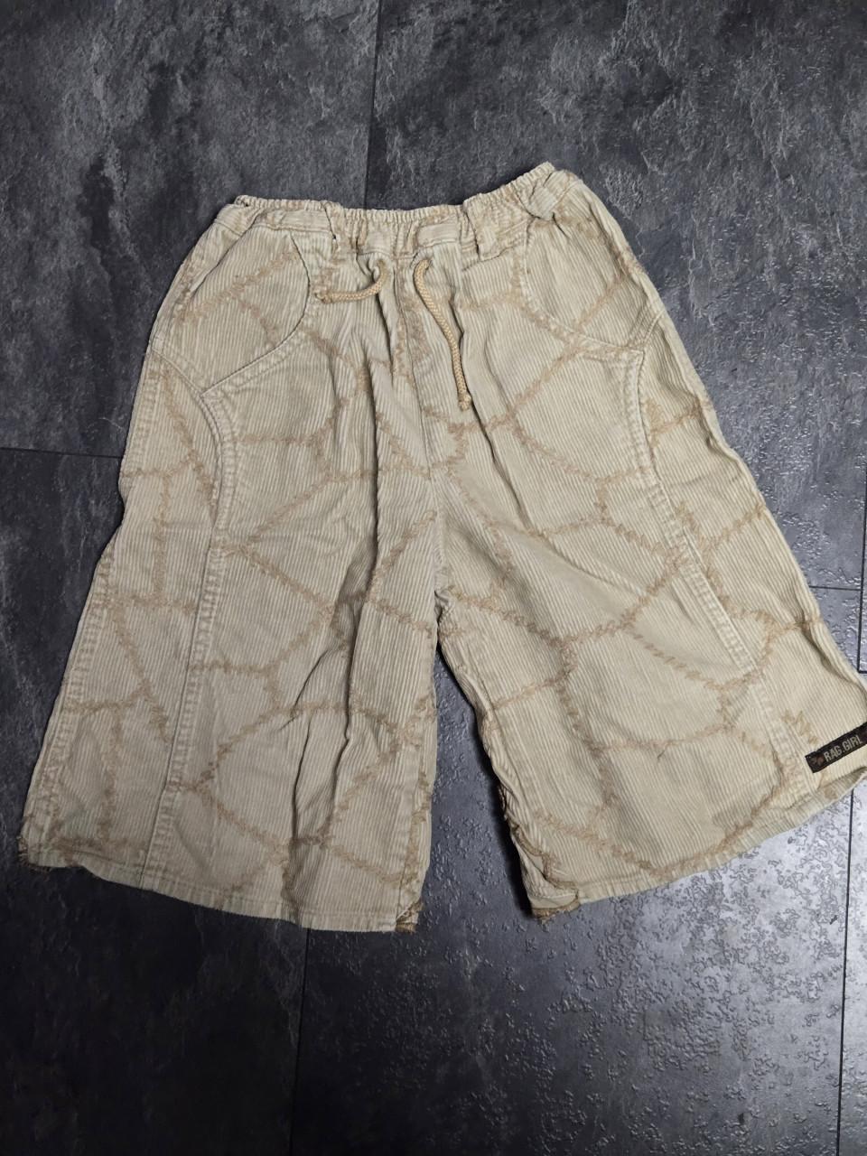 Wijde, beige corduroy broek met een abstract patroon van "Rag Girl" Maat 98
