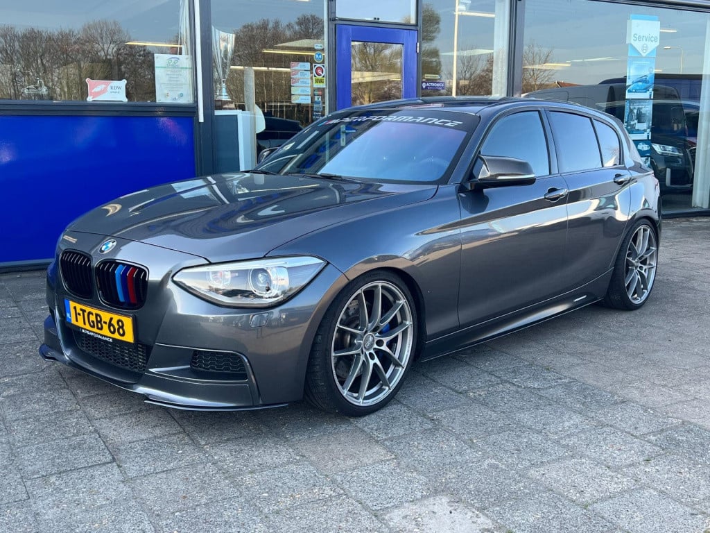 BMW 1 Serie m135i xdrive high executive, customized, stage 2 437 pk!
