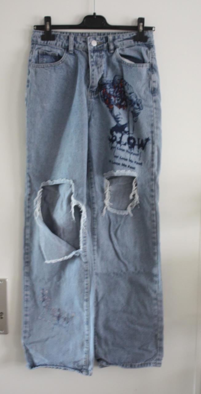 Spijkerbroek met print en gaten  maat s-36