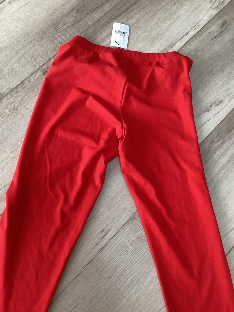 Nieuwe rode legging met kaartje er nog aan maat L