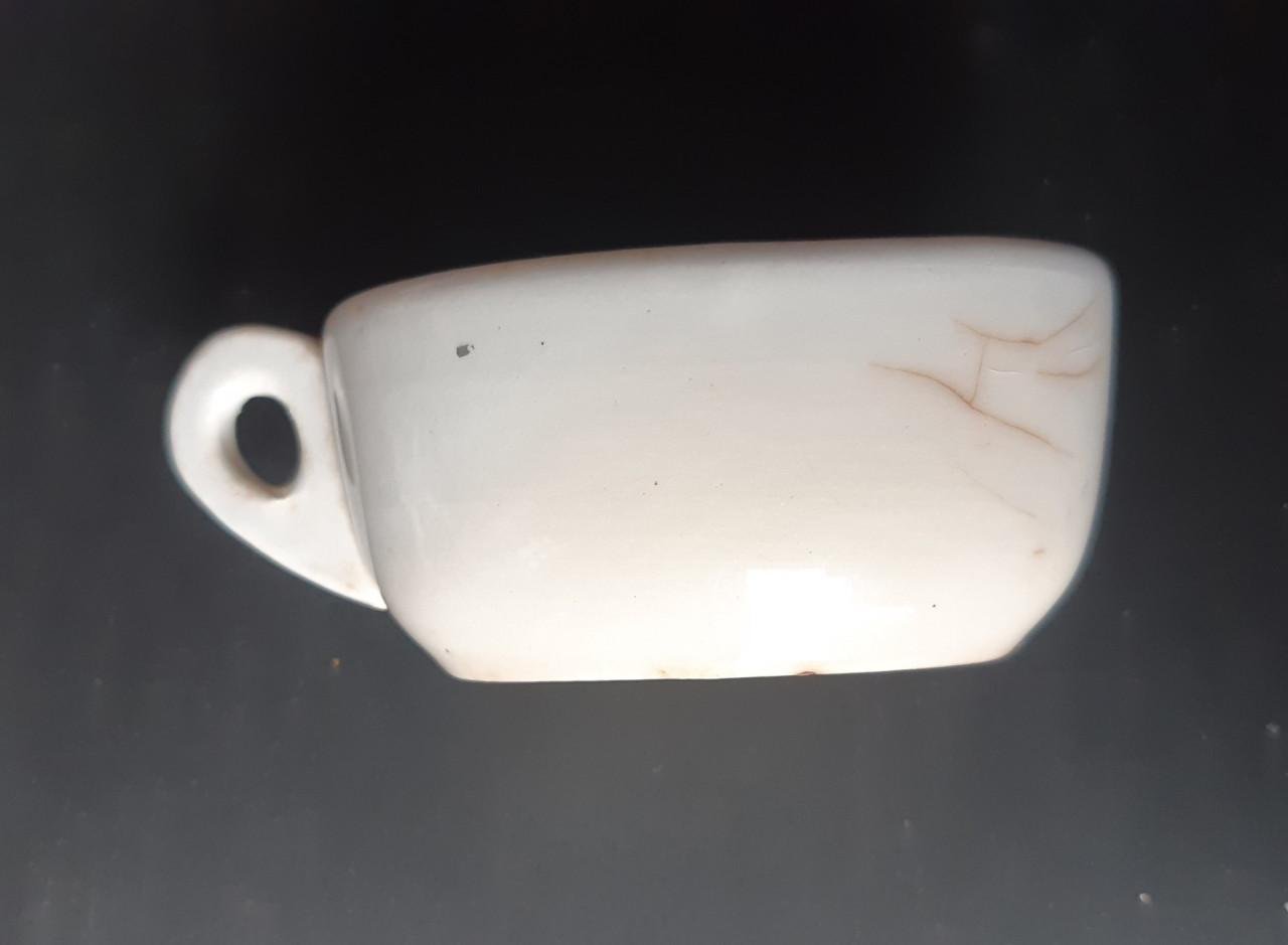 Petrus Regout wit theelicht op pootjes met vetschuitje