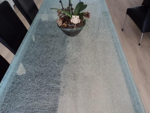 Te koop mooie crash glazen eettafel +salontafel met metalen poten grijs