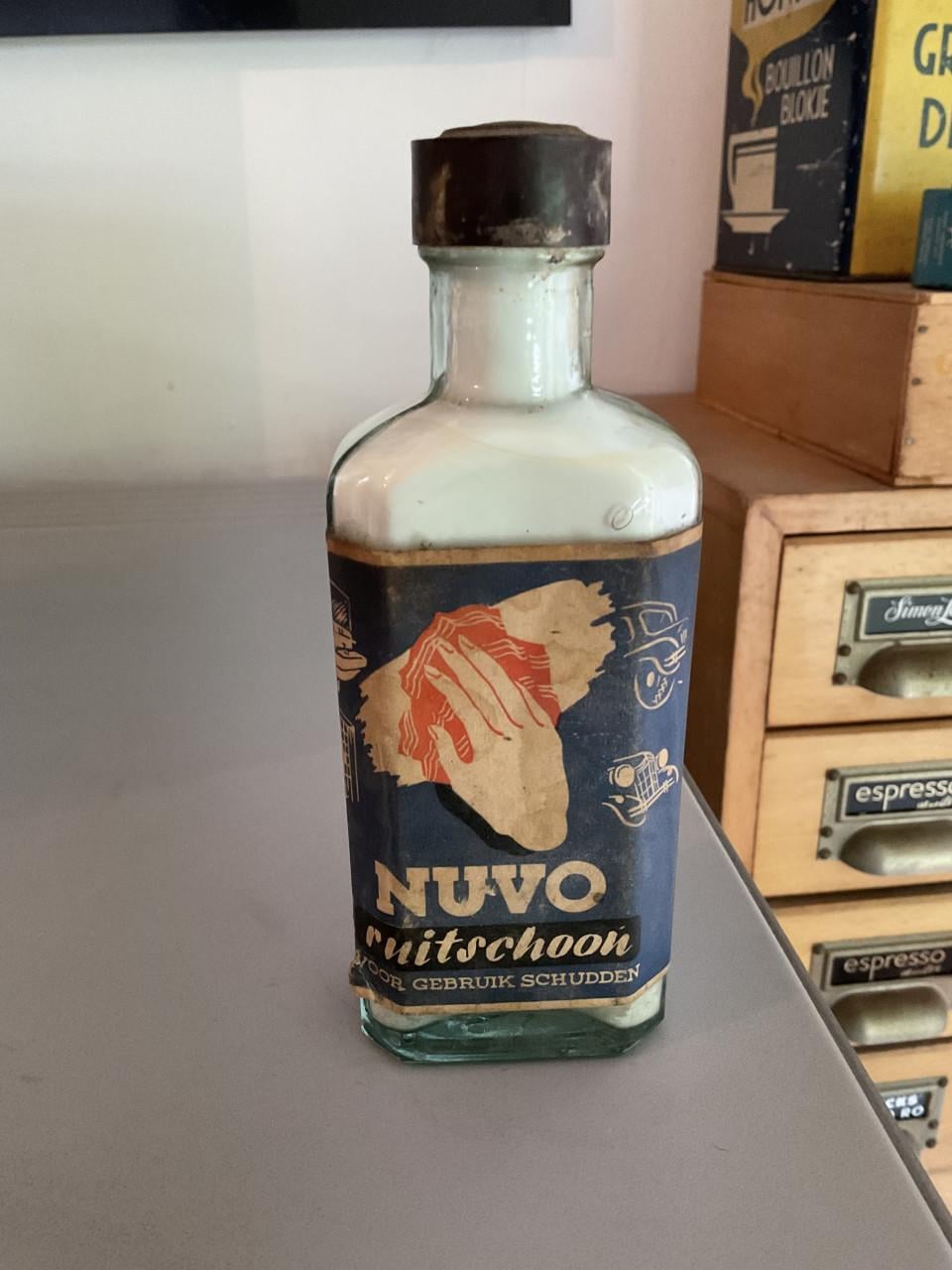 Oud flesje Nuvo ruitschoon