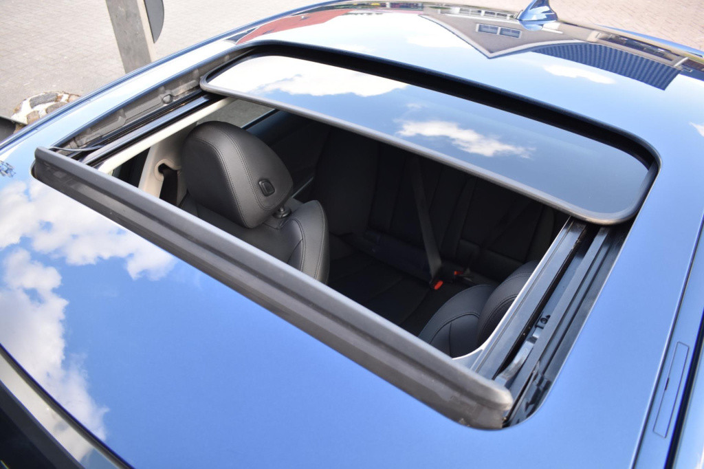 BMW 3-serie 320i high executive | harman kardon | schuif kanteldak | leder 