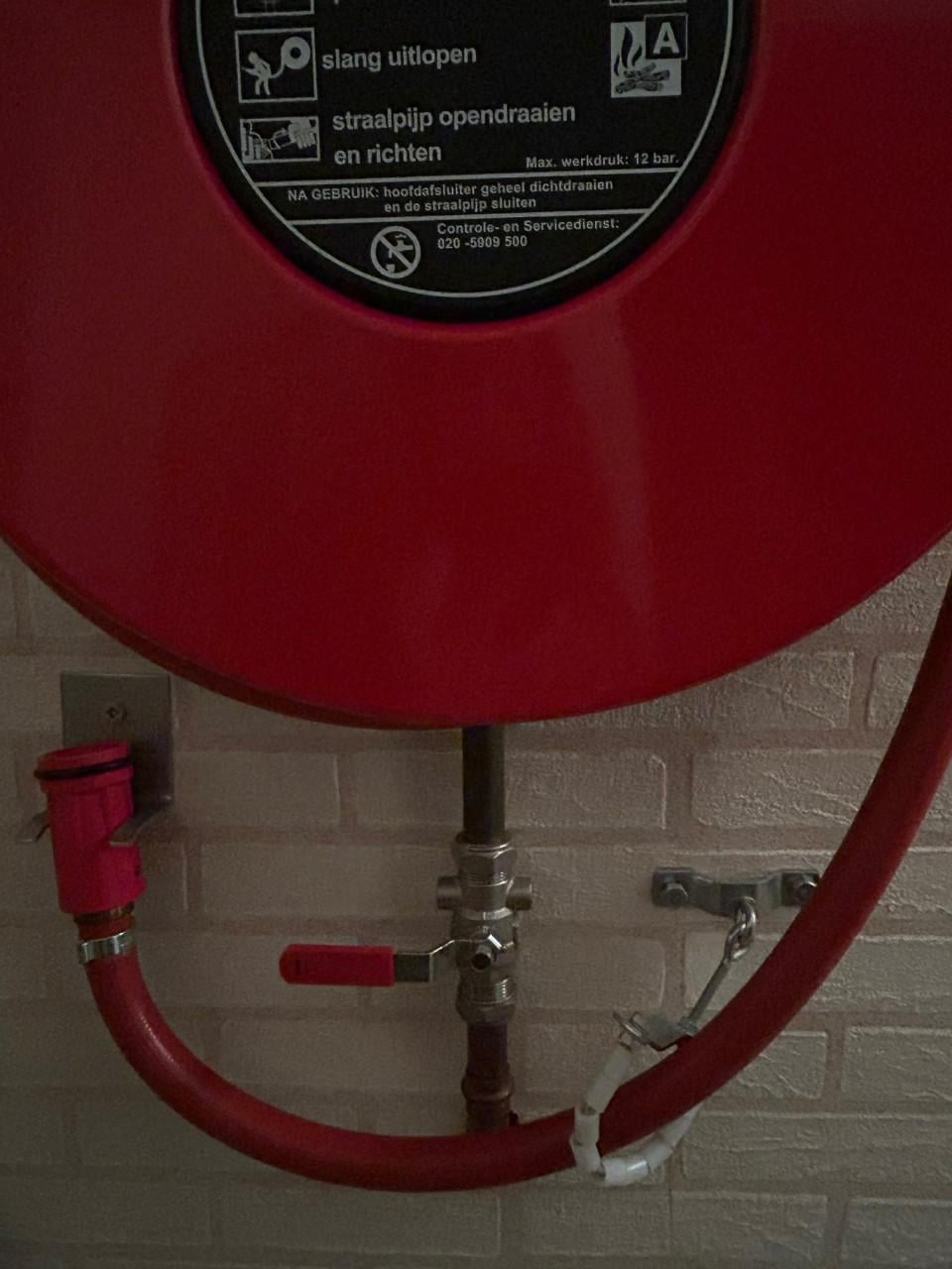 Te koop : Brandslang van Ajax op haspel