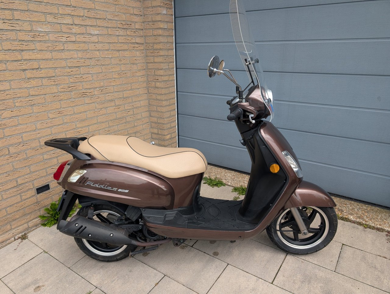 Zeer nette Sym Fiddle II scooter met slechts 4700 echte km op de teller