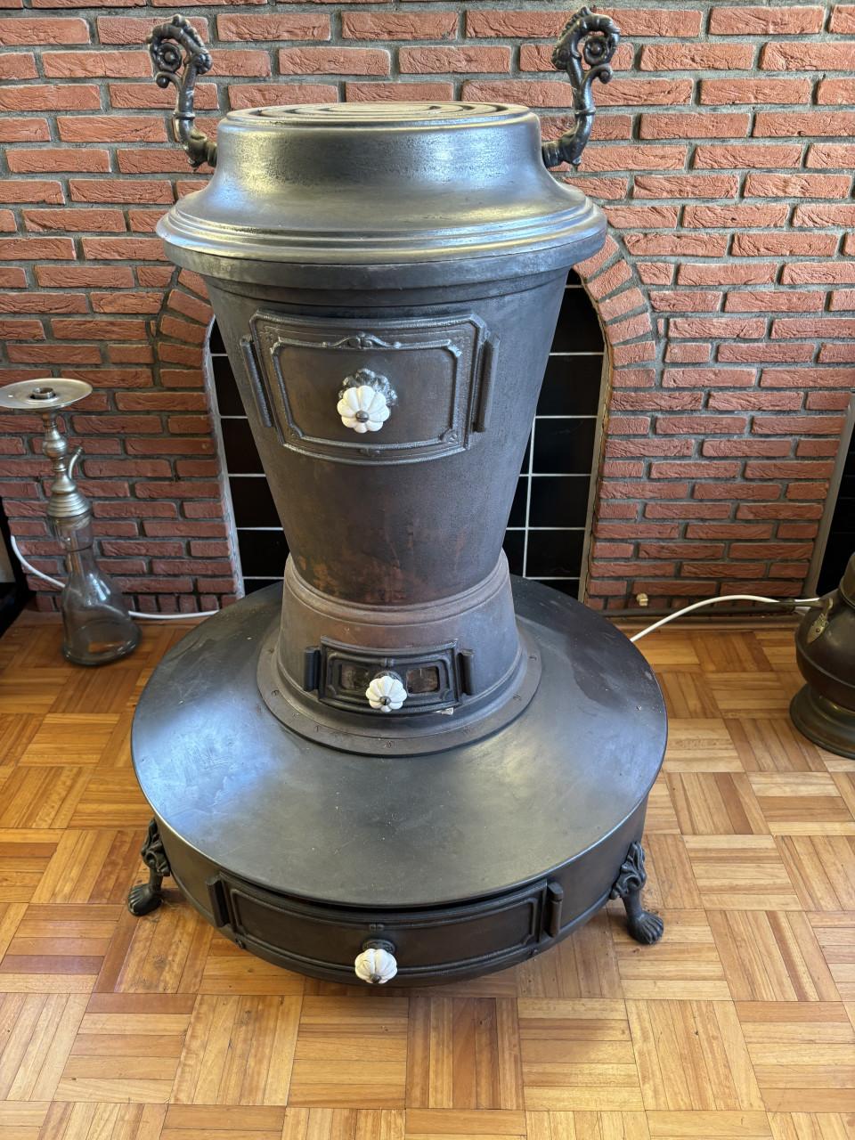 Antieke buiskachel gasblok
